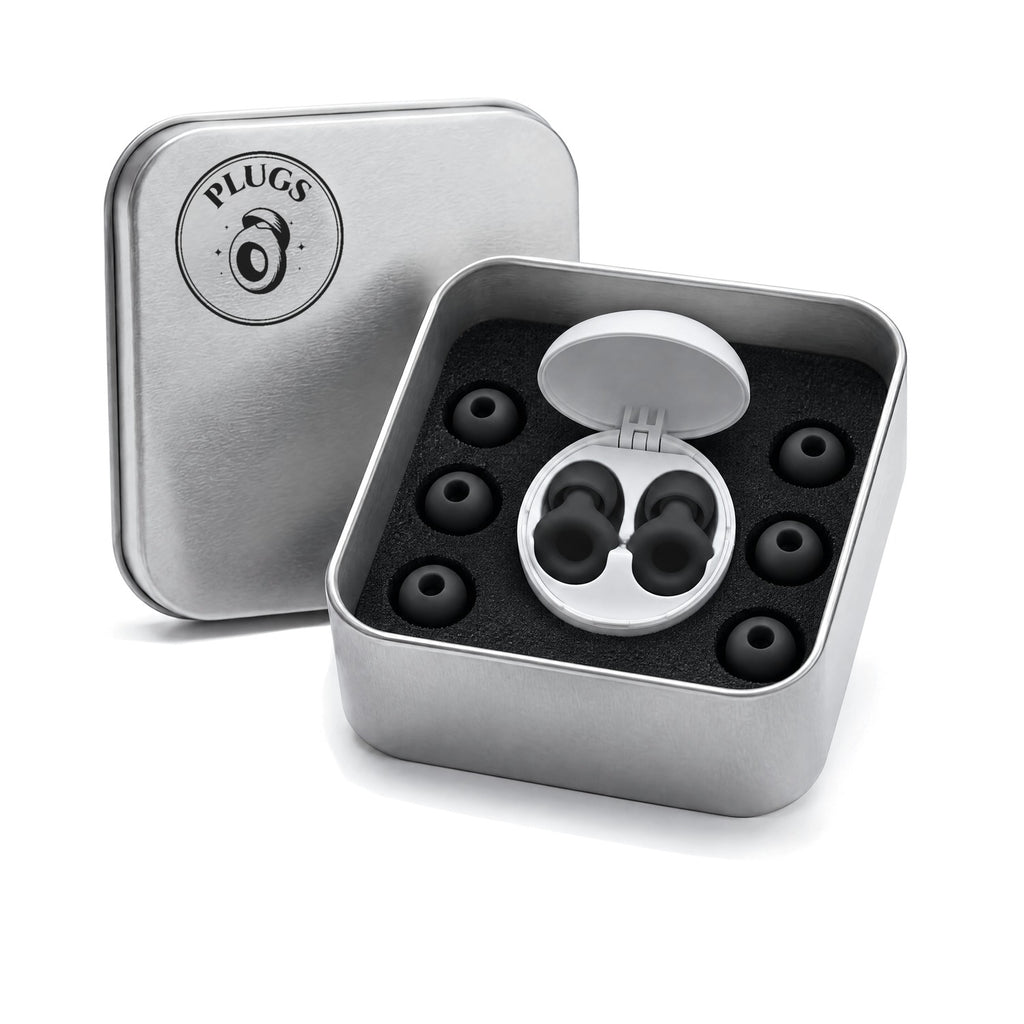 Open steel PLUGS tin with the Black pair in its round white carry case and three spare pairs of ear tips around it